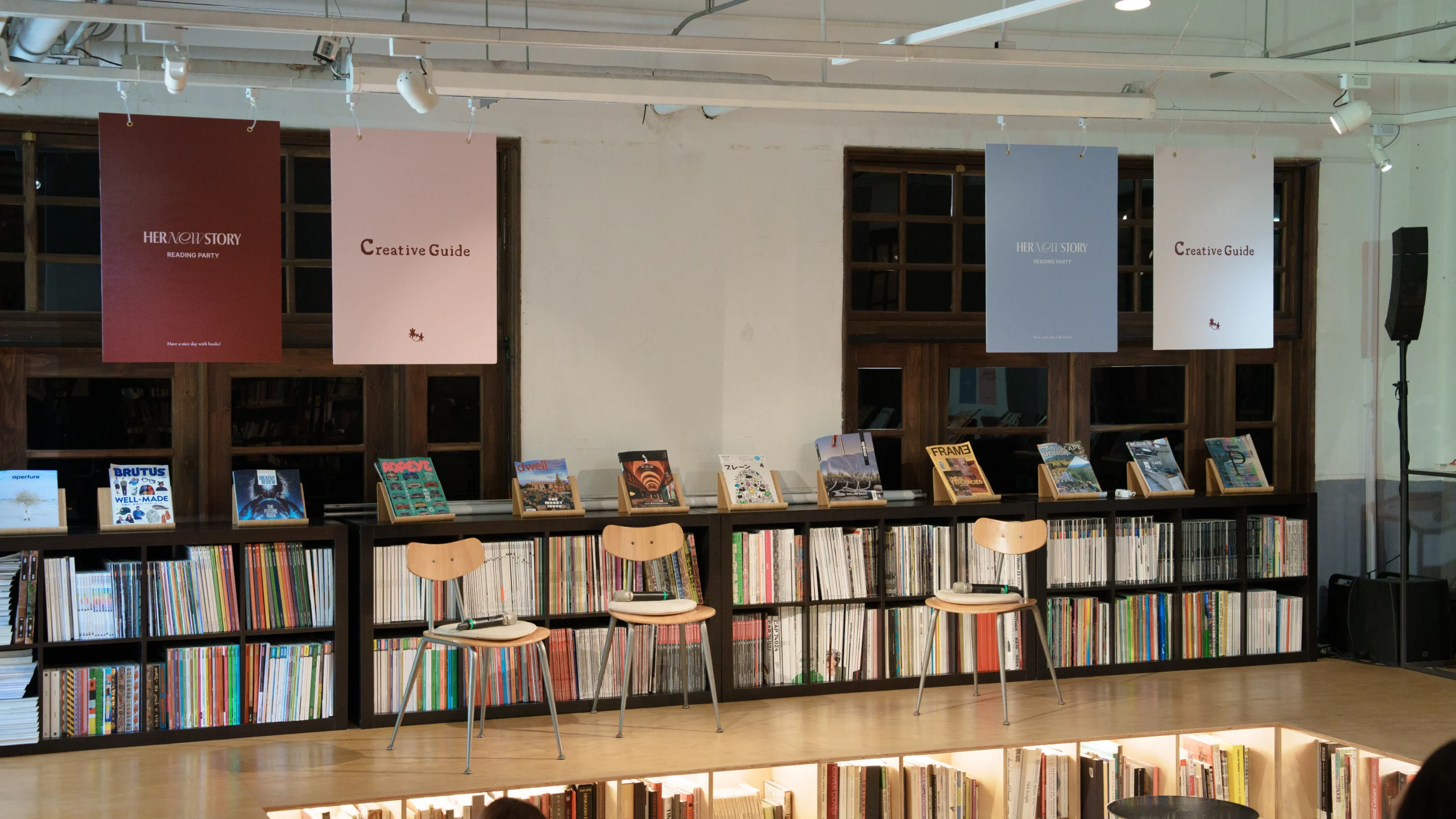 不只是圖書館：整場空間，書牆、圓桌與環形座位